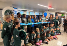 MSU athletes, Big Ten cut ribbon on $50K donation to Lansing school