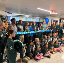 MSU athletes, Big Ten cut ribbon on $50K donation to Lansing school